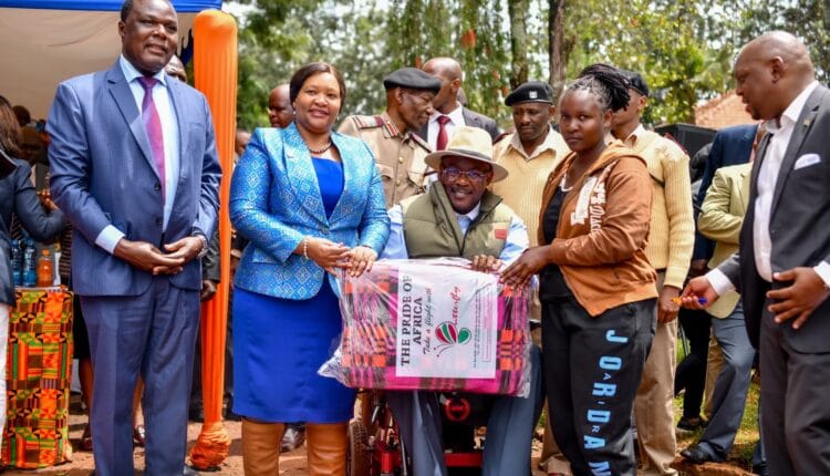 PS Juma Mukhwana, CS Rebecca Miano and Westlands MP with other stakeholders during donation to flood victims.